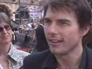 Tom Cruise gets soaked during an interview