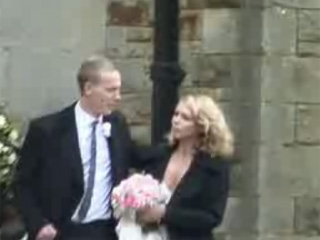 Billie Piper hides her wedding dress as she marries actor Laurence Fox