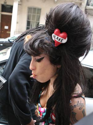 Amy Winehouse will perform at Nelson Mandela gig and Glastonbury