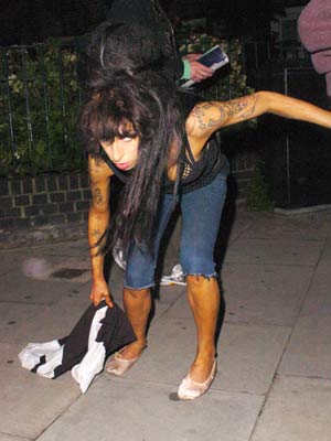 SEE PHOTOS Amy Winehouse is back on the town