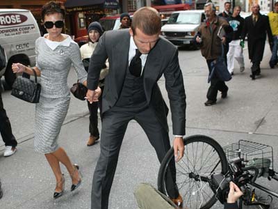 David Beckham | David Beckham helps lady up | Now magazine