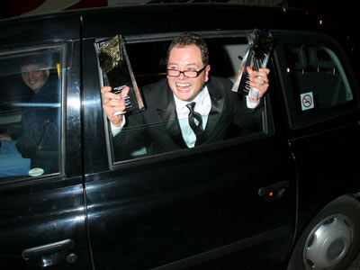 Alan Carr | Alan Carr flashes his gongs | Pictures | Now magazine | celebrity gossip