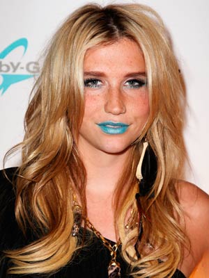 OMG! Kesha posts shocking picture of herself weeing in the street on Twitter