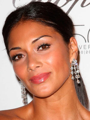 Nicole Scherzinger's weakness is peanut butter but she's all muscle