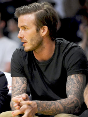 David Beckham works the geek chic look
