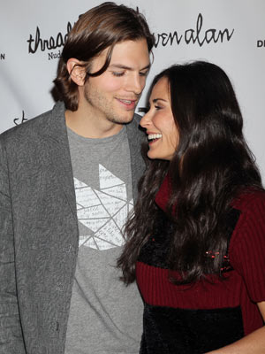 Demi Moore 'still texting' ex Ashton Kutcher when she's low