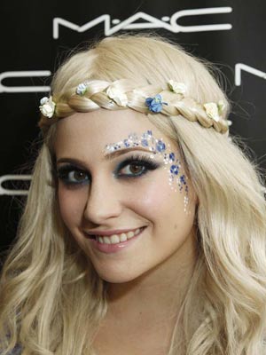 EXCLUSIVE Pixie Lott rocks face paint at the IOW Festival