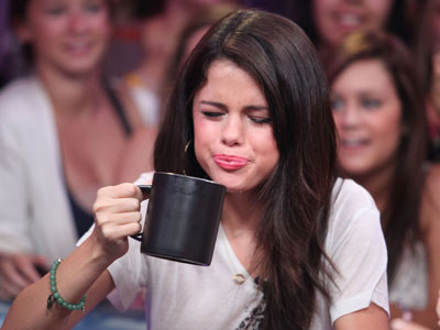 Brave Selena Gomez drinks pickle juice on live chat show in Canada
