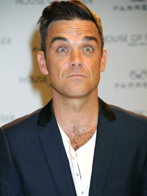 Robbie Williams: Harry Styles is so beguiling - One Direction are quite a power