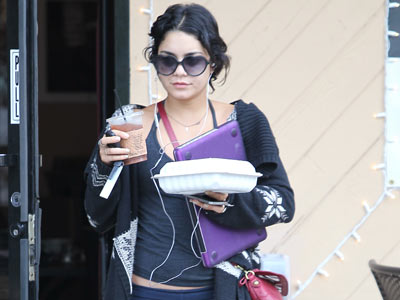 Vanessa Hudgens sports messy hair as she grabs some fast food in LA