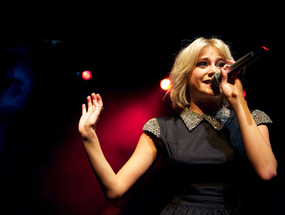 Pixie Lott is cute in cat ears and little black dress at London concert Pixie Lott is cute in cat ears and little black dress at London concert