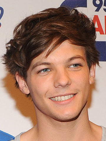 OMG! One Direction's Louis Tomlinson shows off huge new stag arm tattoo in sexy white vest
