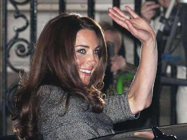 Kate Middleton keeps dress hidden under chic grey coat at first Royal engagement without Prince William