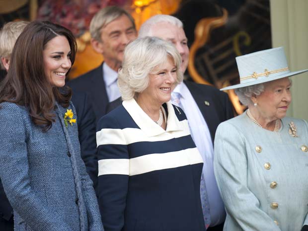 Kate Middleton wears chic blue designer coat for Royal visit with the Queen in London 