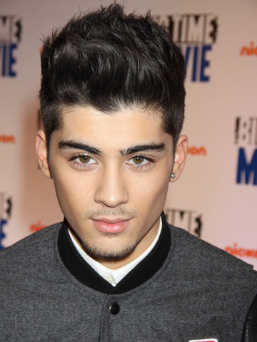 One Direction's Zayn Malik reveals new chest tattoo on Twitter