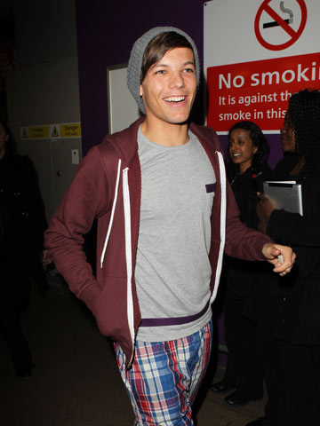 One Direction return home to UK after Up All Night tour 