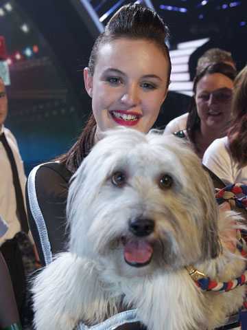 BGT winner Ashleigh Butler smothers Pudsey with pink kisses