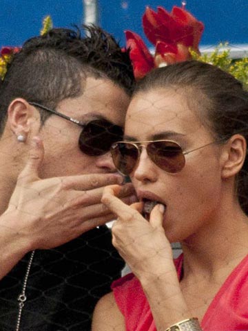 Cristiano Ronaldo cuddles up to girlfriend Irina Shayk and his cute son on yacht in St Tropez after Euro 2012 defeat