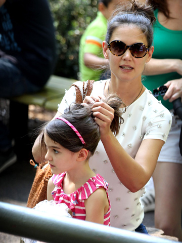 Katie Holmes and Suri enjoy day at the zoo after Tom Cruise divorce settlement is announced 