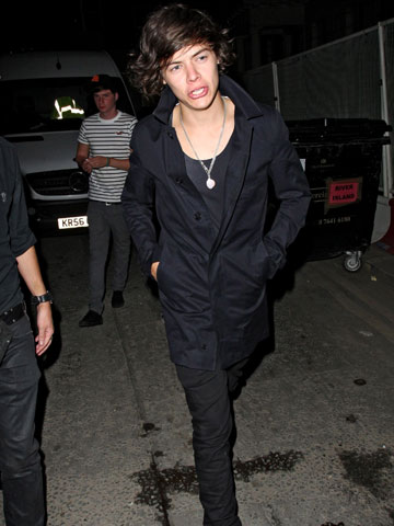One Direction star Harry Styles parties at London club with pretty blonde