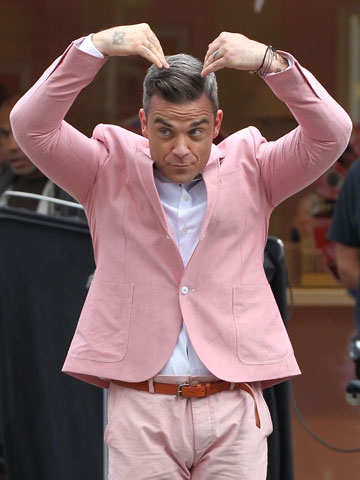 Robbie Williams is voting for The X Factor's Rylan Clark to wind Gary Barlow up. Ha! 