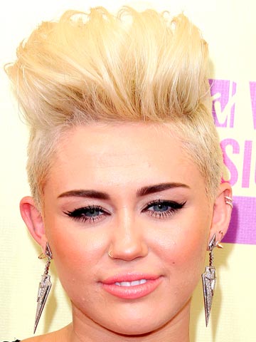 OMG! Miley Cyrus posts Twitter photo of herself 'in bed with' Harry Styles after Taylor Swift split