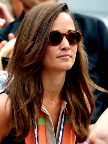 Cute! Pippa Middleton kisses boyfriend Nico Jackson on slopes after finishing ski marathon