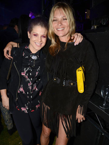 Harry Styles ditches One Direction to party with Kate Moss and Kelly Osbourne at London Fashion Week bash 