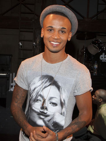 JLS star Aston Merrygold wows Twitter fans with upside down star jump photo 