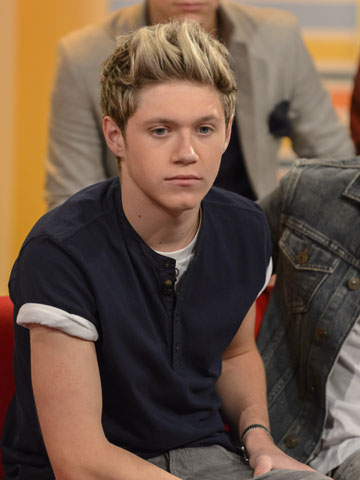 One Direction's Niall Horan has 'glands like snooker balls' after catching Louis Tomlinson's nasty bug