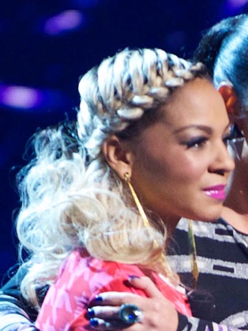 X Factor star Jade Ellis works a sexy side plait