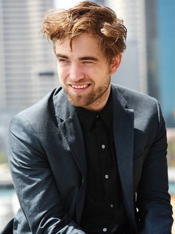 Robert Pattinson promotes the final Twilight film without girlfriend Kristen Stewart