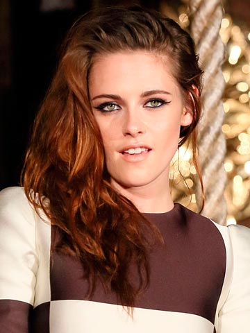 Kristen Stewart talks about love triangles while promoting new Twilight film without Robert Pattinson