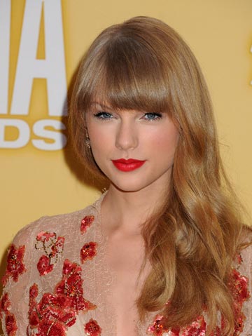Taylor Swift gets death threats after messing around with Harry Styles but Simon Cowell approves 