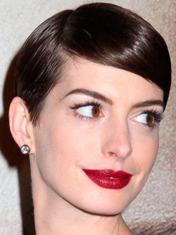 OMG! Sacha Baron Cohen jokes about Anne Hathaway wardrobe malfunction at Golden Globes
