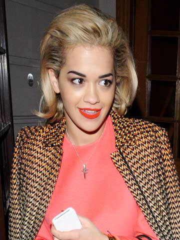 Rita Ora's neon orange lips