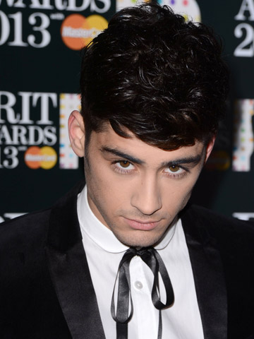 What's happened to Zayn Malik? One Direction star shows off sooooo skinny legs and shaved face in Miami