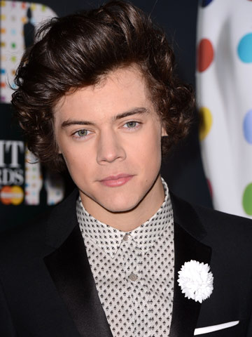 One Direction's Harry Styles 'gets sweaty' with pretty blonde on Norway party bus after fan grabs him