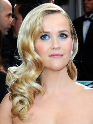 Reese Witherspoon: I dance to Pitbull in my kitchen