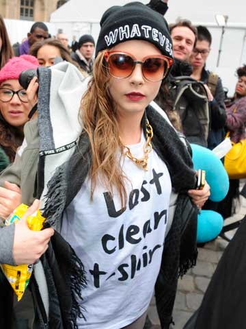 Cara Delevingne wears new plush red lips
