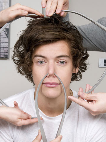 One Direction are measured for wax Madame Tussauds models 