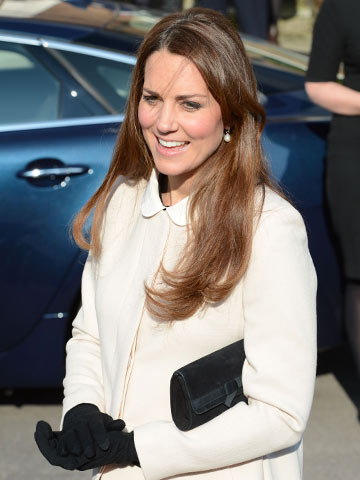 Pregnant Kate Middleton reveals baby bump on visit to Child Bereavement UK