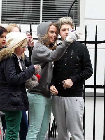 One Direction's Niall Horan flashes sexy new smile after having tooth braces removed in London 