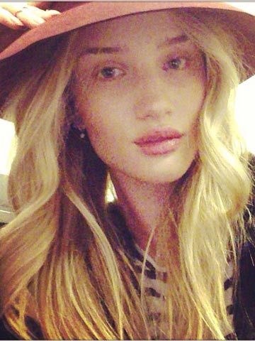 Rosie Huntington-Whiteley jets out of LA in sexy tight leather