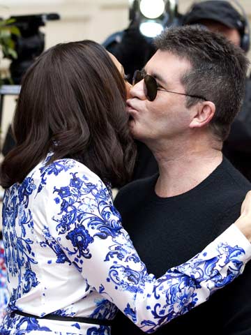 Ooh! Simon Cowell plays Cupid for Alesha Dixon