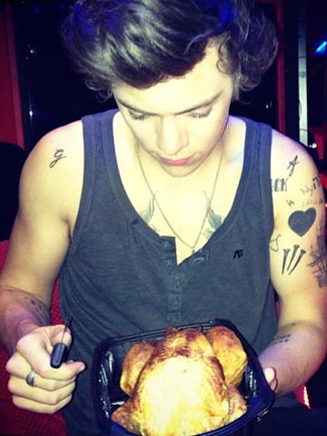 One Direction's Harry Styles snapped with hot new bird on tour in Antwerp