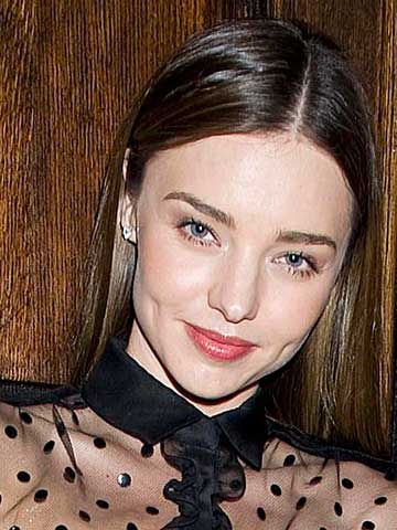 Nipple slip! Miranda Kerr's boobs pop out of top on photoshoot