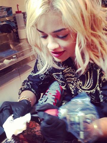 Copying Rihanna and Justin Bieber? Rita Ora turns tattoo artist