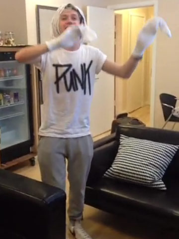 One Direction's Niall Horan dances with underpants on his head for mystery blonde