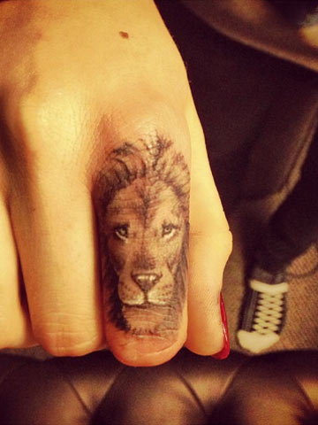 Lion Tattoo On Finger